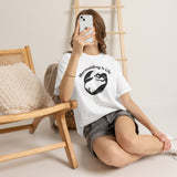 Woman sitting with phone wearing Mermaiding Is Life mermaid T-shirt