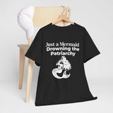 Black Just a Mermaid Drowning the Patriarchy feminist T-shirt displayed on a hanger